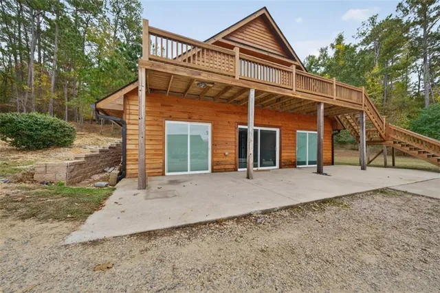 a bathroom with a shower and a sink