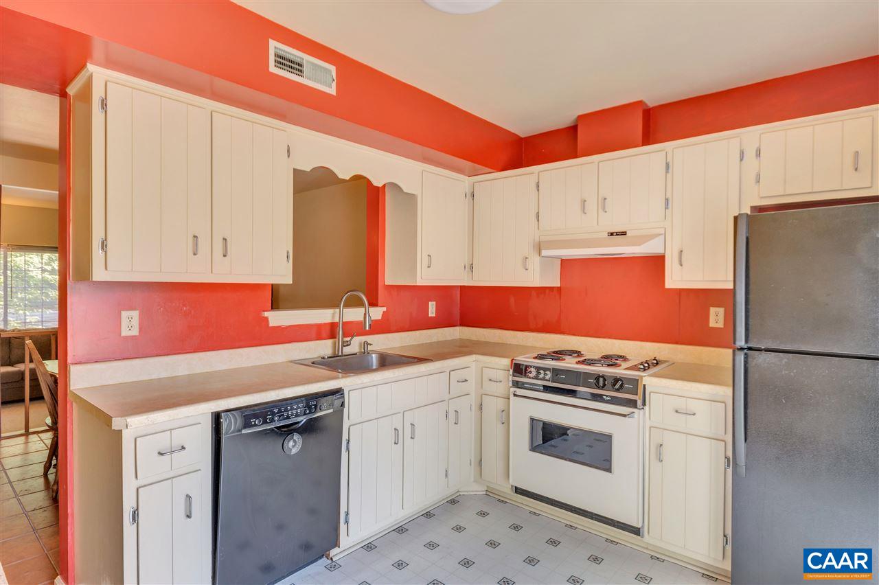 1607 Cool Spring Road Charlottesville, VA 22901 - Photo 5 of 19 a kitchen with a sink stove and white refrigerator