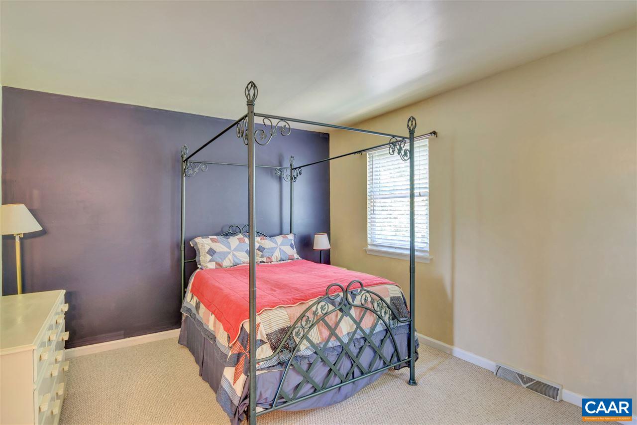 1607 Cool Spring Road Charlottesville, VA 22901 - Photo 10 of 19 a bedroom with a bed and a window