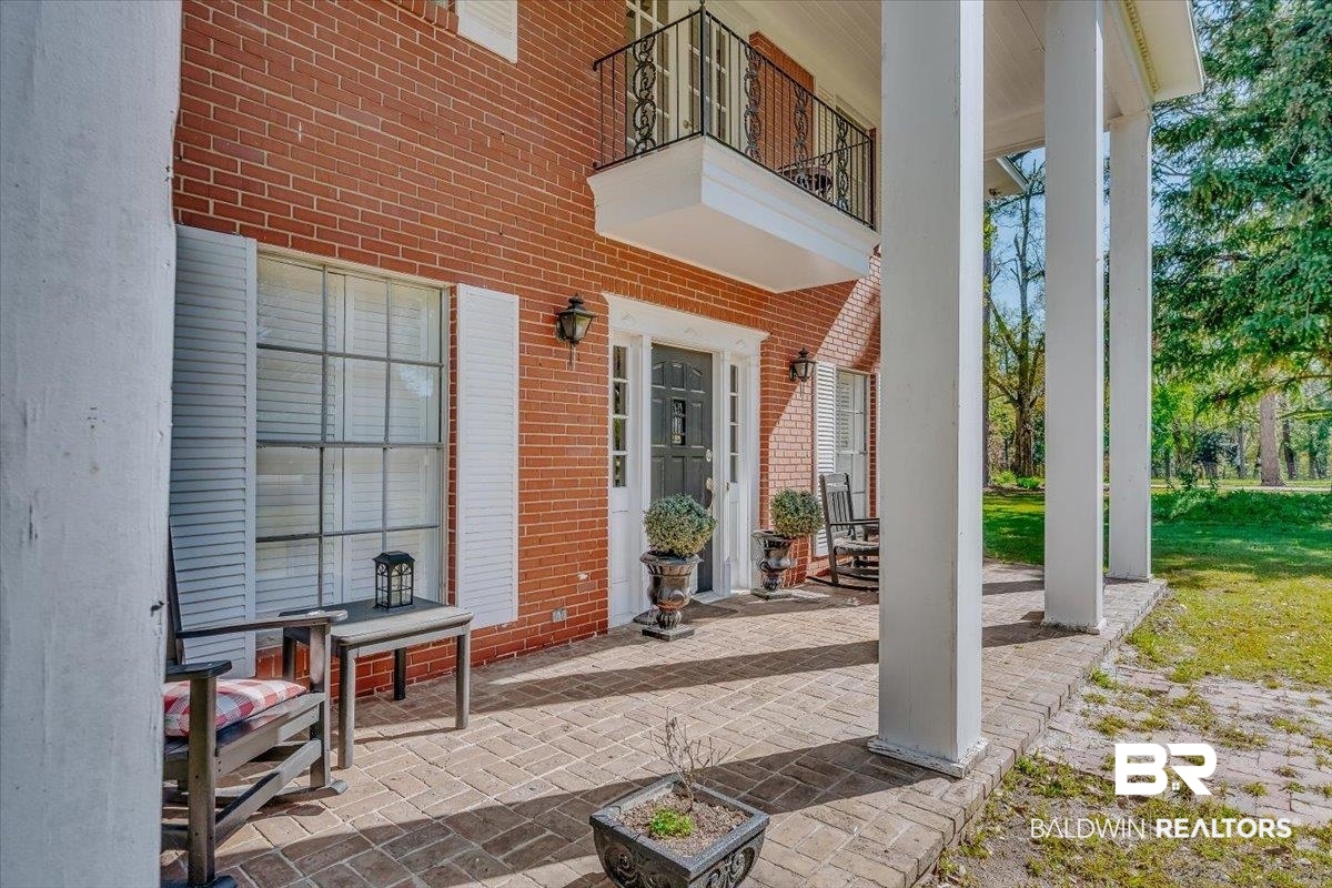 14160 Moffett Road Wilmer, AL 36587 - Photo 65 of 75 View of patio with a balcony