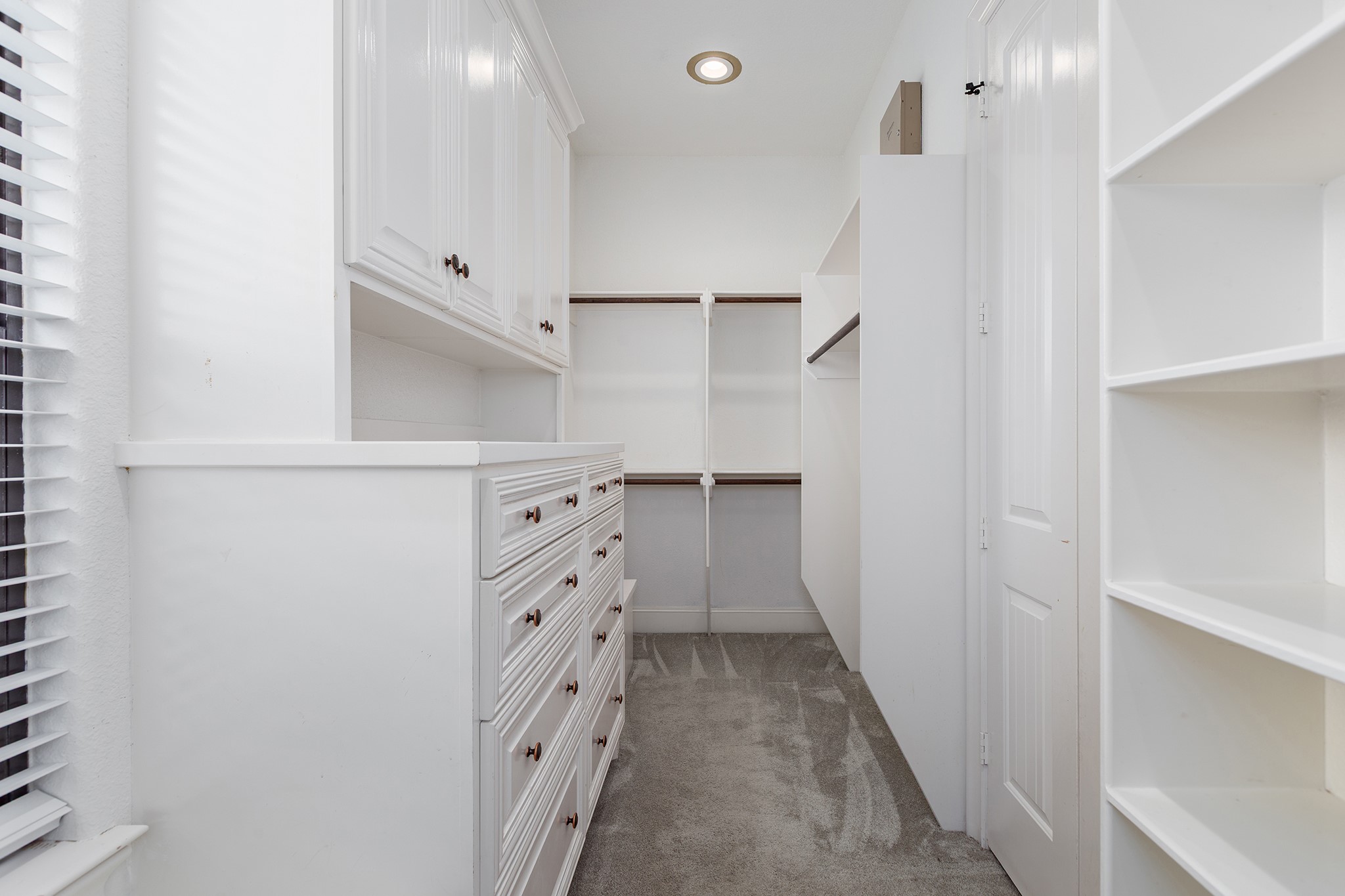 5507 Bright Timber Landing Drive Spring, TX 77386 - Photo 27 of 45 Primary closet with plenty of built-ins and storage