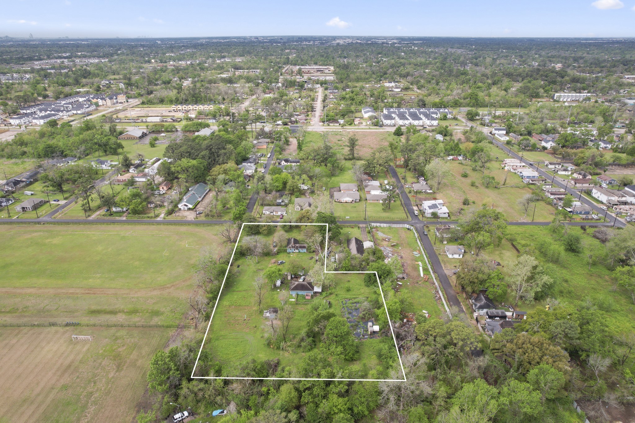 6302 Tuskegee Street Houston, TX 77091 - Photo 13 of 27 an aerial view of residential houses with outdoor space