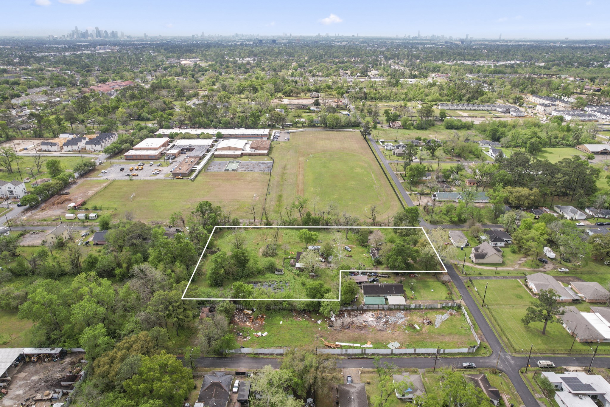 6302 Tuskegee Street Houston, TX 77091 - Photo 14 of 27 an aerial view of residential houses with outdoor space