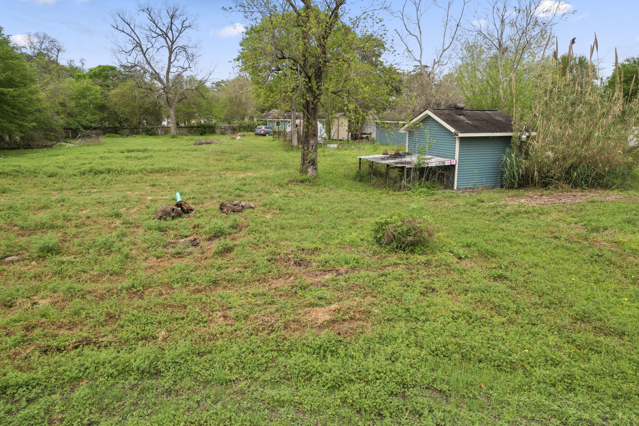 6302 Tuskegee Street Houston, TX 77091 - Photo 20 of 27 a view of a house with a yard