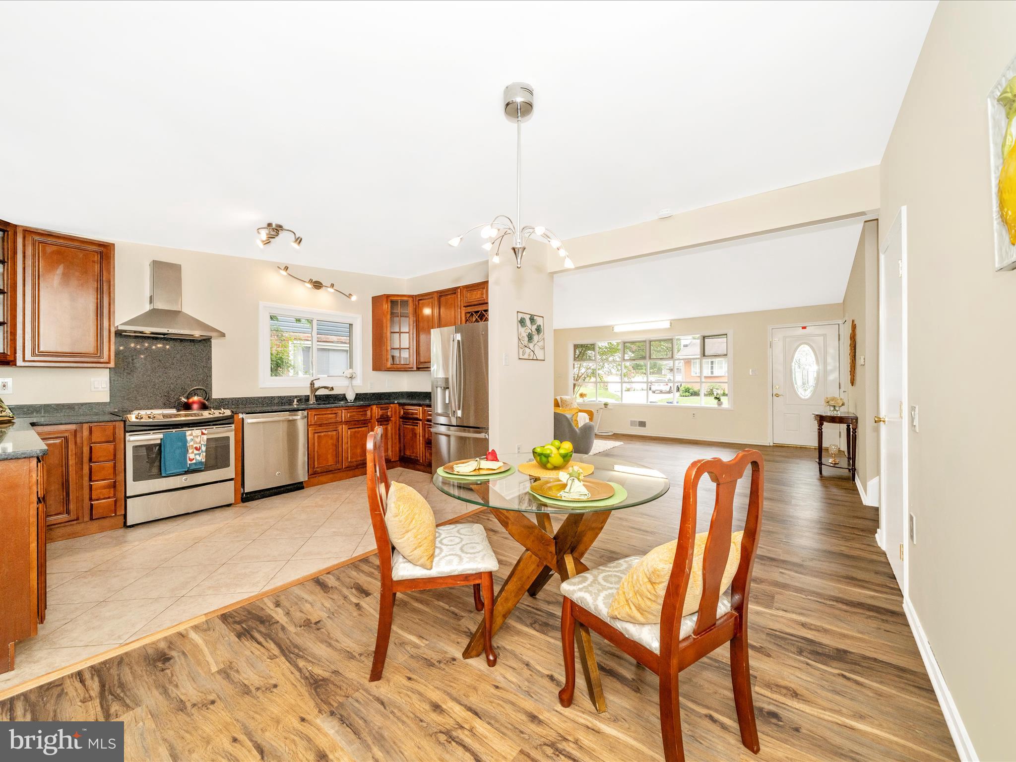 3313 Estelle Terrace Silver Spring, MD 20906 - Photo 11 of 52 a dining room with furniture and wooden floor