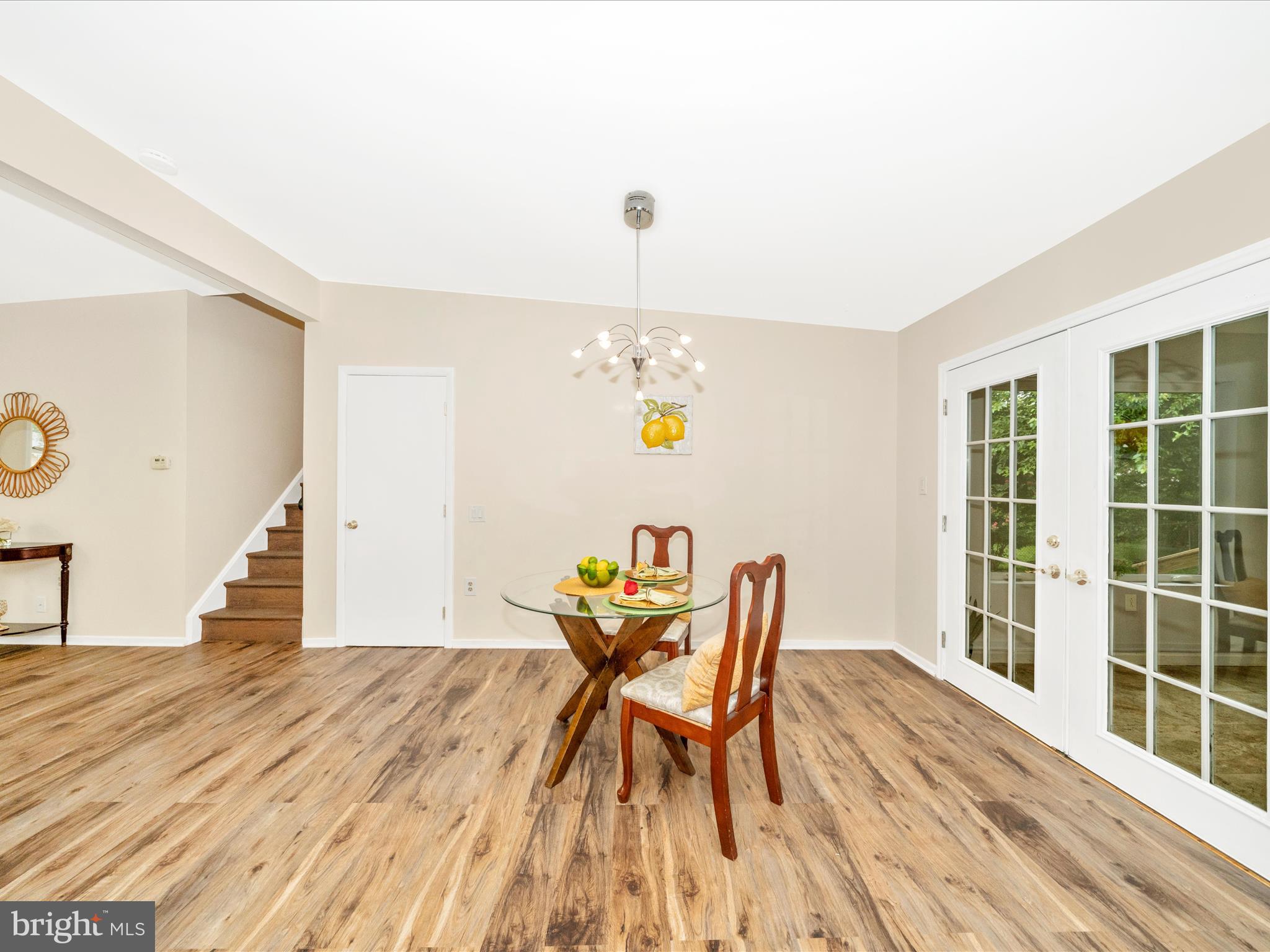 3313 Estelle Terrace Silver Spring, MD 20906 - Photo 12 of 52 a view of a dining room with furniture and wooden floor