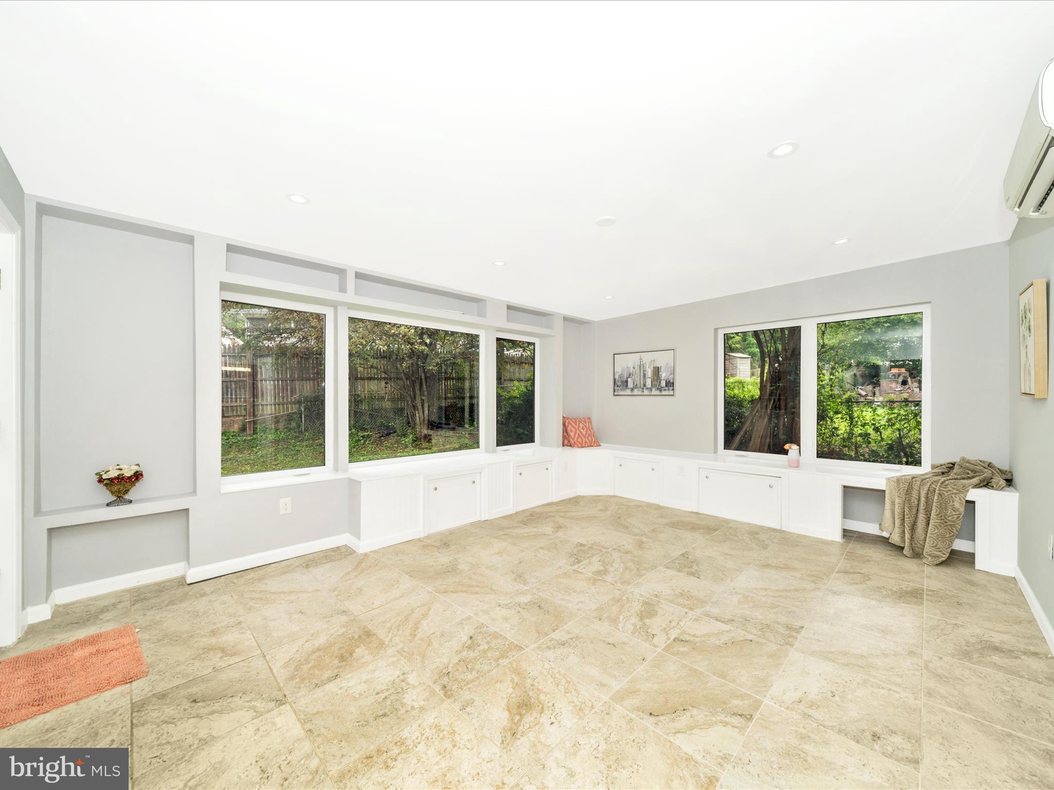 3313 Estelle Terrace Silver Spring, MD 20906 - Photo 18 of 52 a view of an empty room with wooden floor and a window