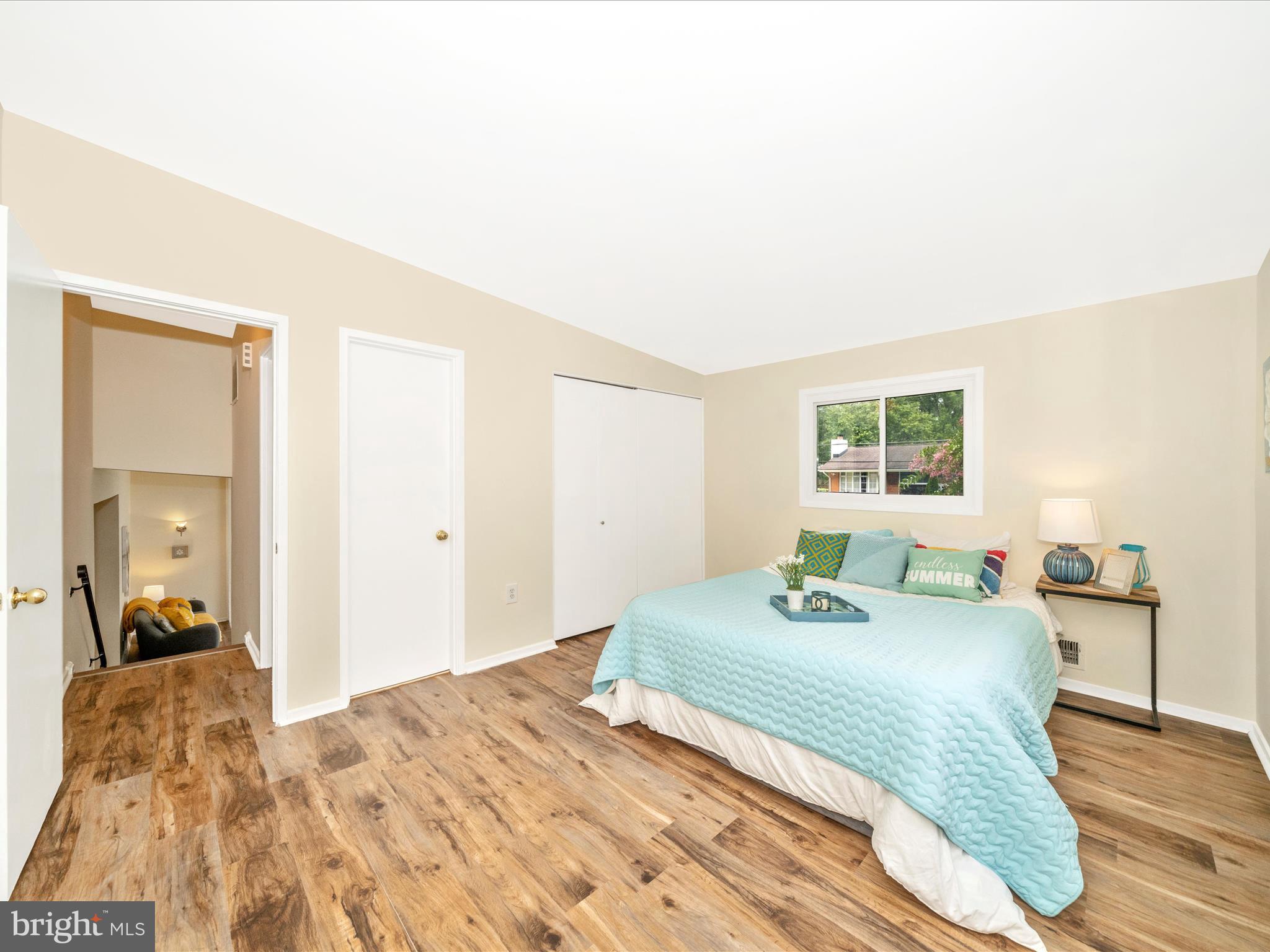 3313 Estelle Terrace Silver Spring, MD 20906 - Photo 23 of 52 a bedroom with a bed and wooden floor