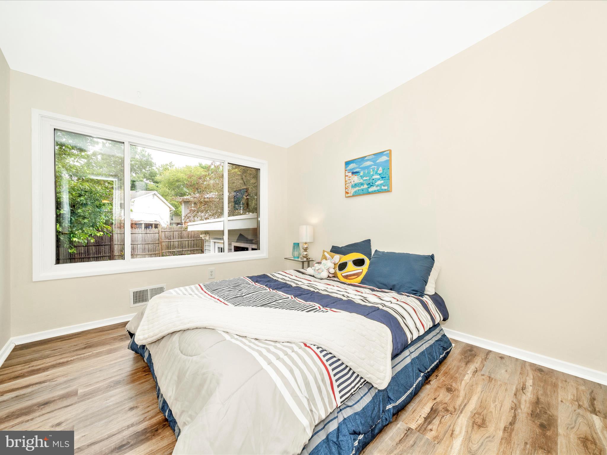 3313 Estelle Terrace Silver Spring, MD 20906 - Photo 26 of 52 a bedroom with a bed and a window