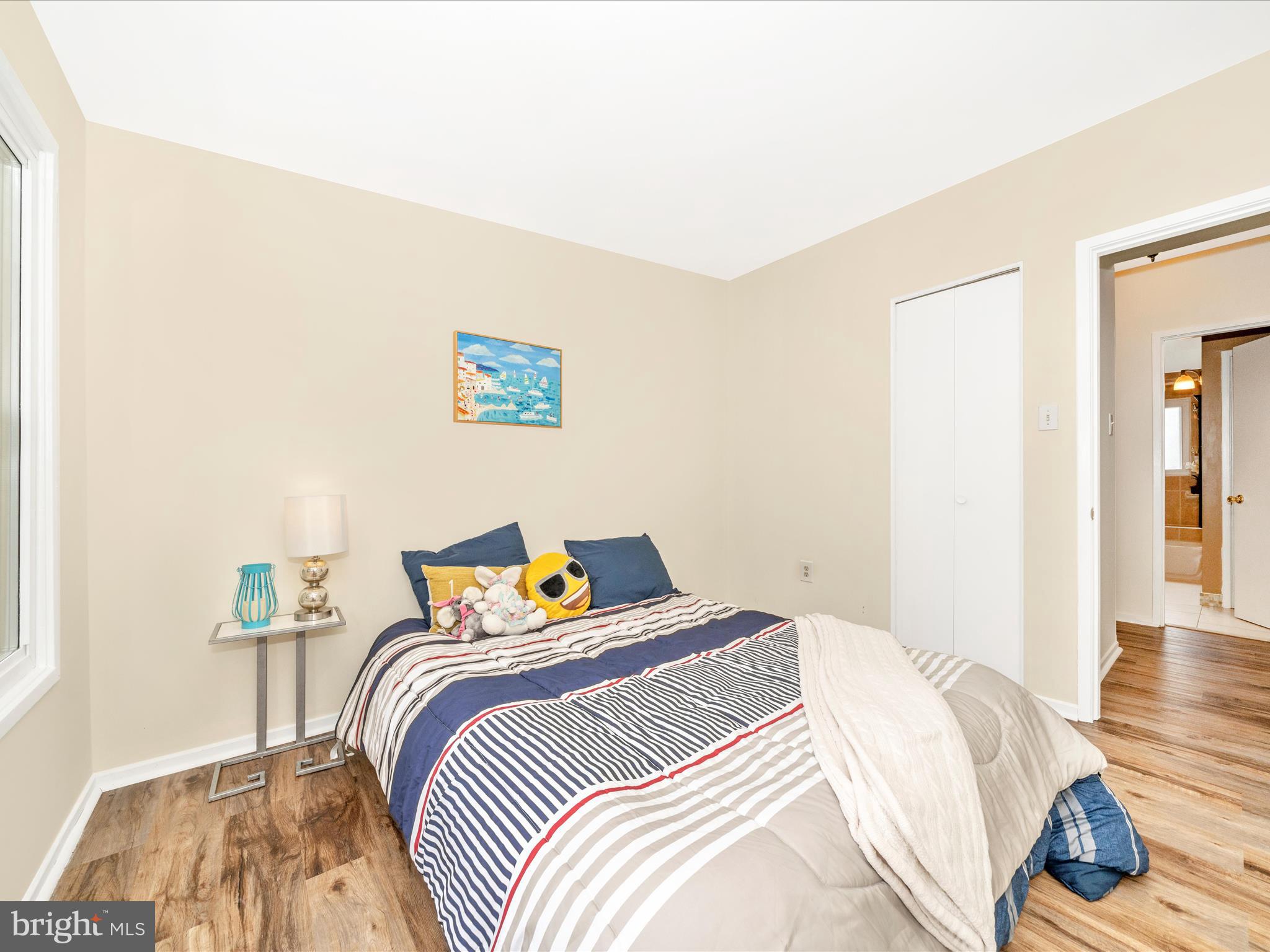 3313 Estelle Terrace Silver Spring, MD 20906 - Photo 28 of 52 a bedroom with a bed and wooden floor