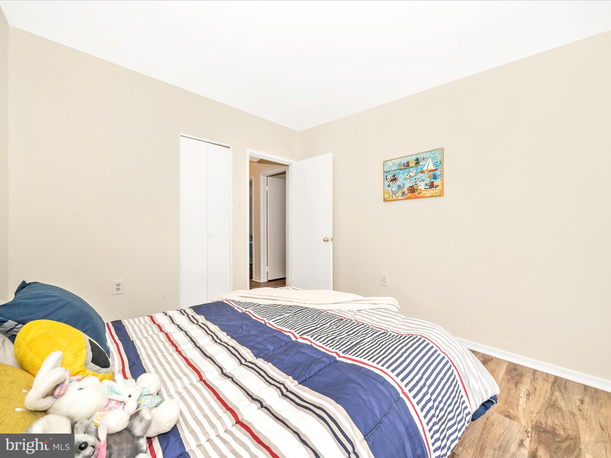 3313 Estelle Terrace Silver Spring, MD 20906 - Photo 29 of 52 a bedroom with a bed and a painting on the wall