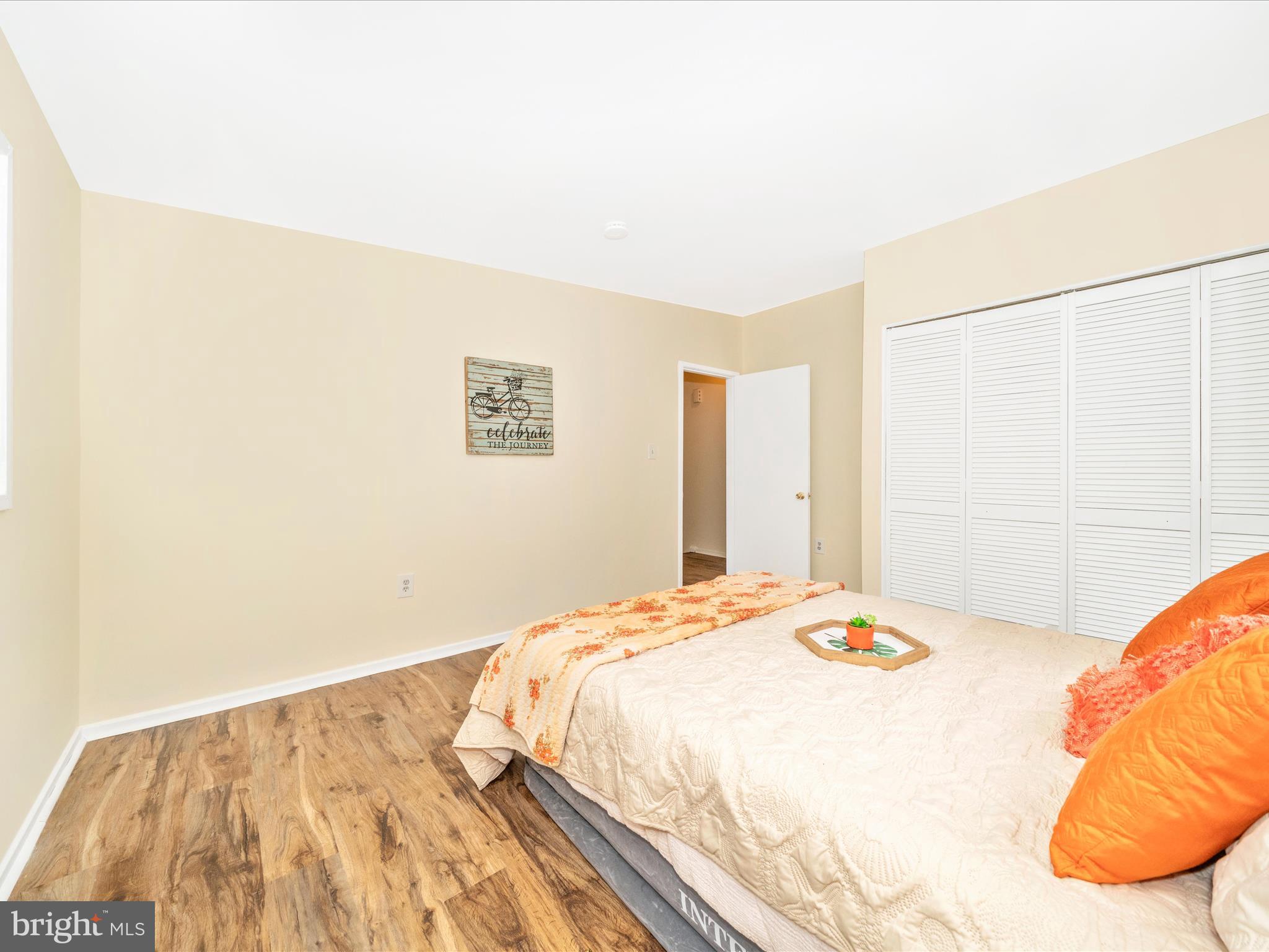 3313 Estelle Terrace Silver Spring, MD 20906 - Photo 33 of 52 a bedroom with a bed and a painting on the wall