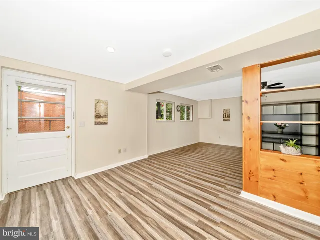 a bathroom with a toilet sink and shower