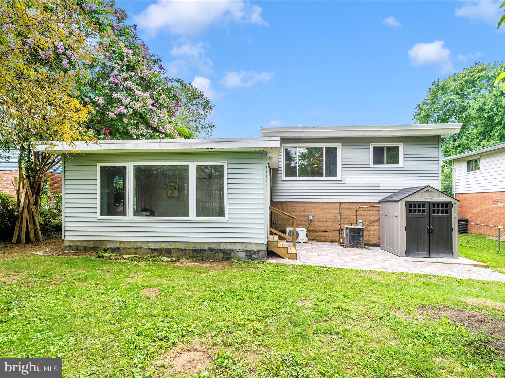 3313 Estelle Terrace Silver Spring, MD 20906 - Photo 47 of 52 a view of a house with a yard and sitting area
