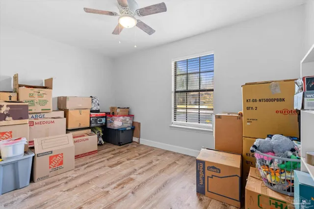 a bed room with a bed and a window