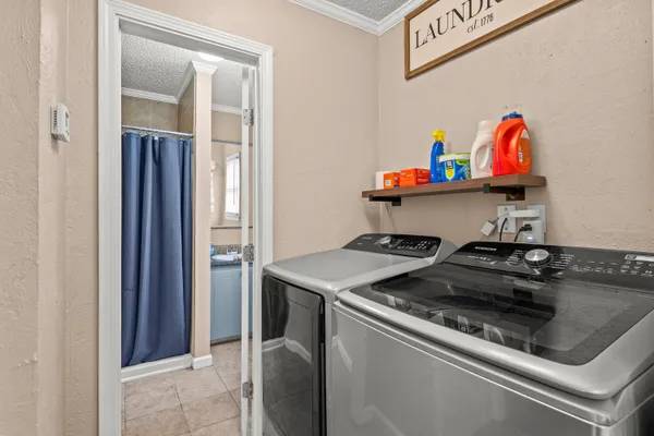 a kitchen with a stove and a sink