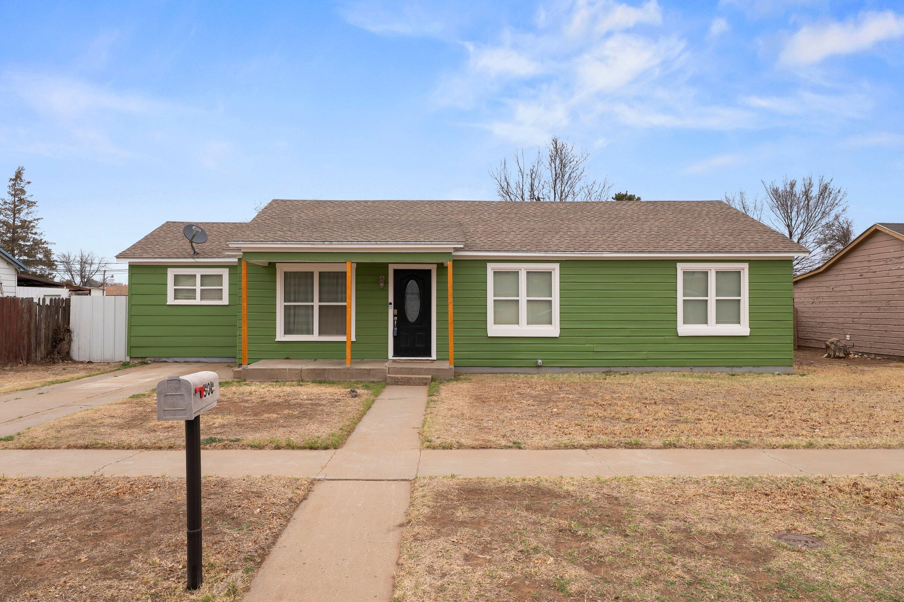 505 East 15th Street Littlefield, TX 79339 - Photo 3 of 22 a house view with a backyard space