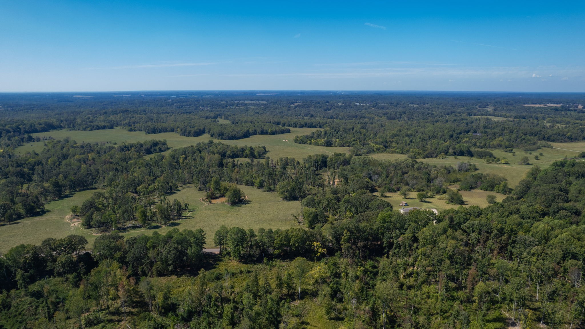 0 Old Paris Murray Road Puryear, TN 38251 - Photo 7 of 42 an aerial view of residential houses with outdoor space and trees