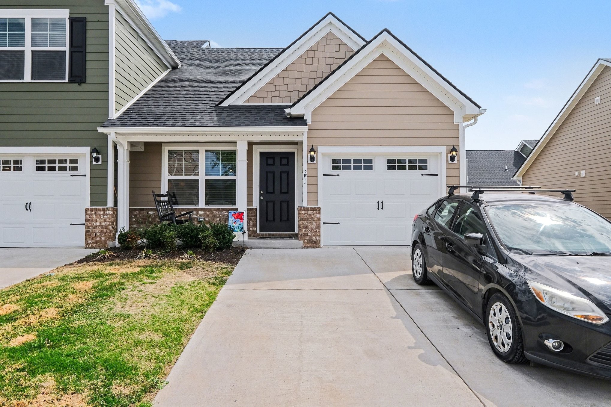381 Ezra Street Pleasant View, TN 37146 - Photo 1 of 31 a view of a car parked front of a house