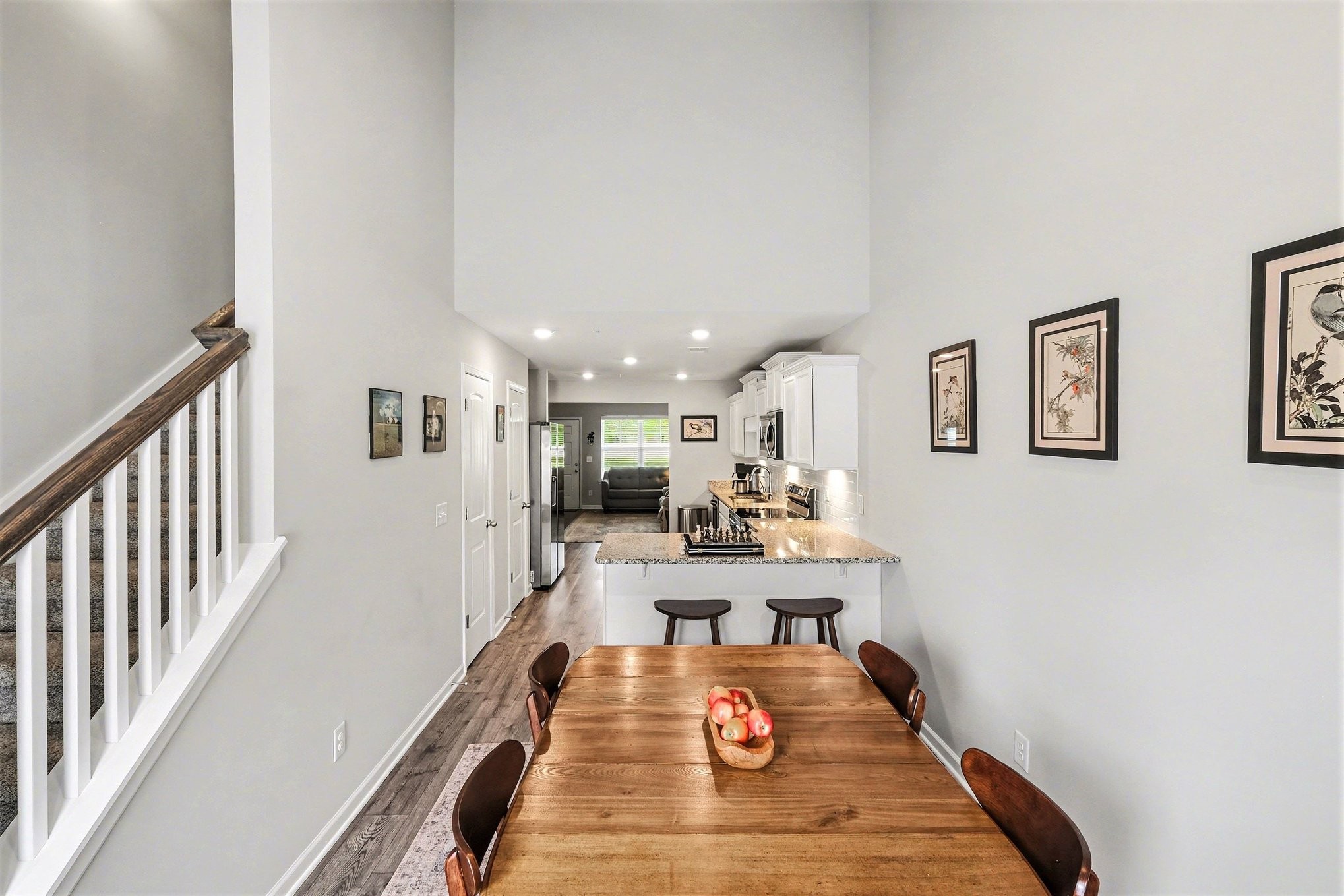 381 Ezra Street Pleasant View, TN 37146 - Photo 15 of 31 a view of a kitchen with dining table and chairs