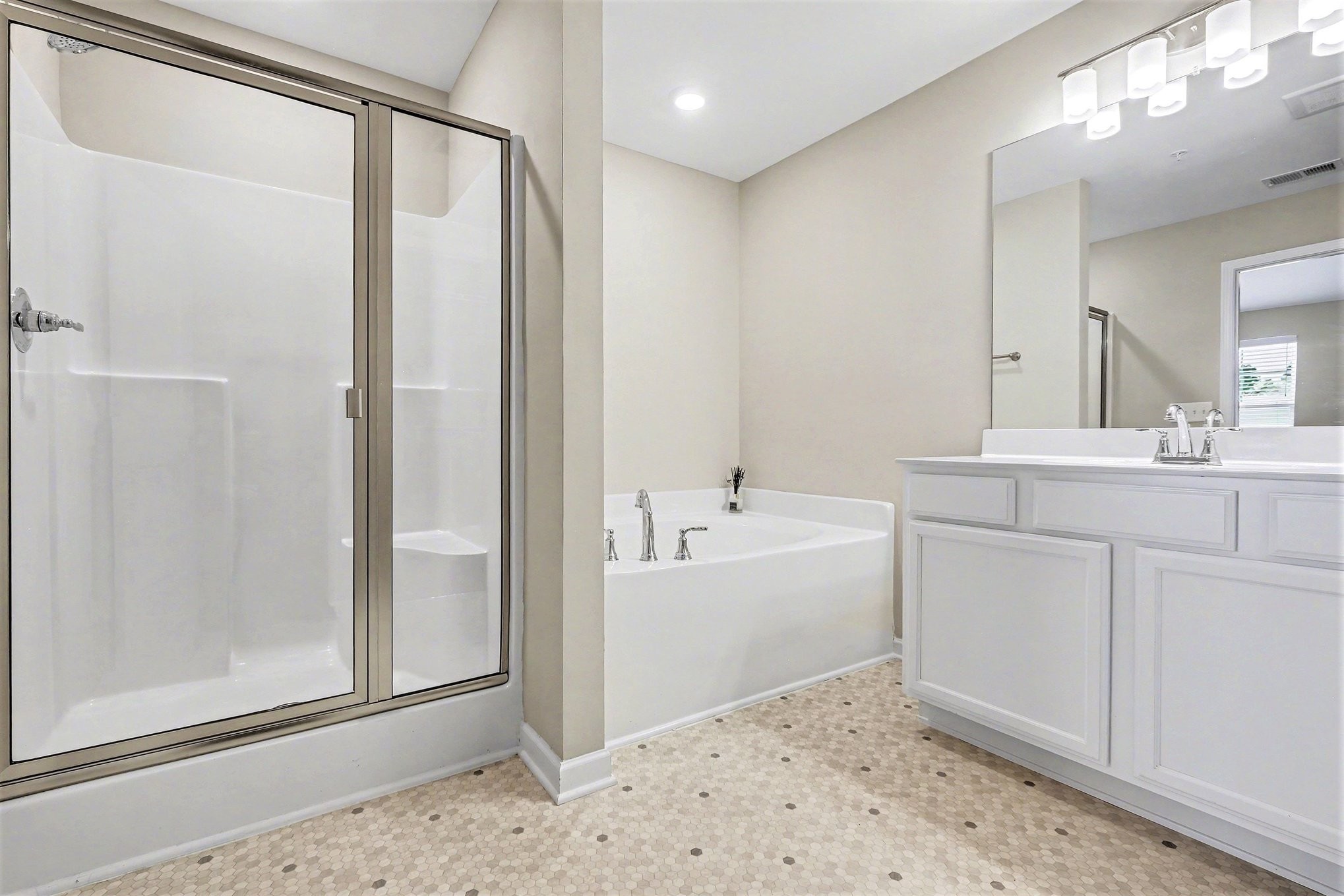 381 Ezra Street Pleasant View, TN 37146 - Photo 23 of 31 a bathroom with a tub sink and mirror