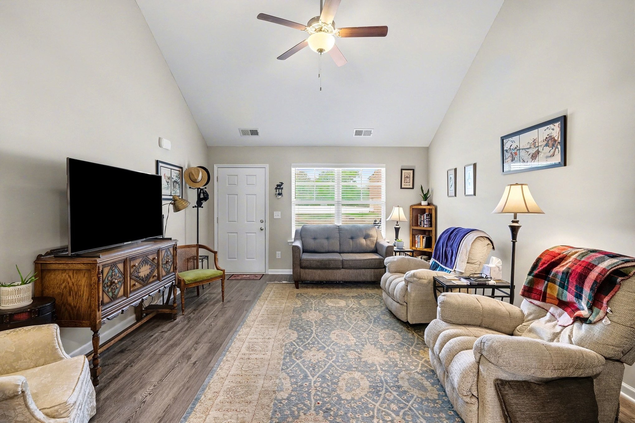 381 Ezra Street Pleasant View, TN 37146 - Photo 6 of 31 a living room with furniture and a flat screen tv