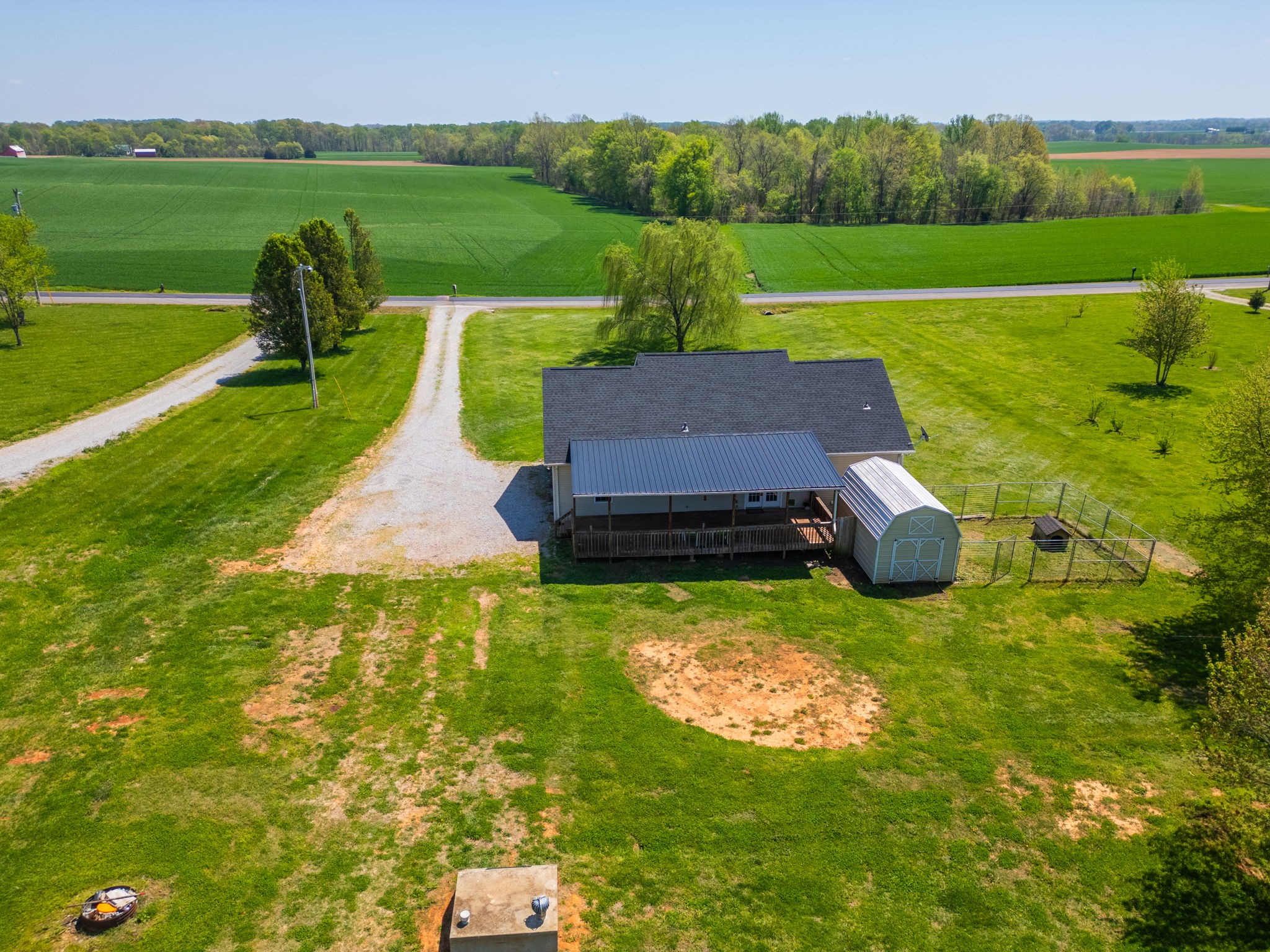 5958 Fred Perry Road Springfield, TN 37172 - Photo 24 of 32 a view of a garden with lawn chairs