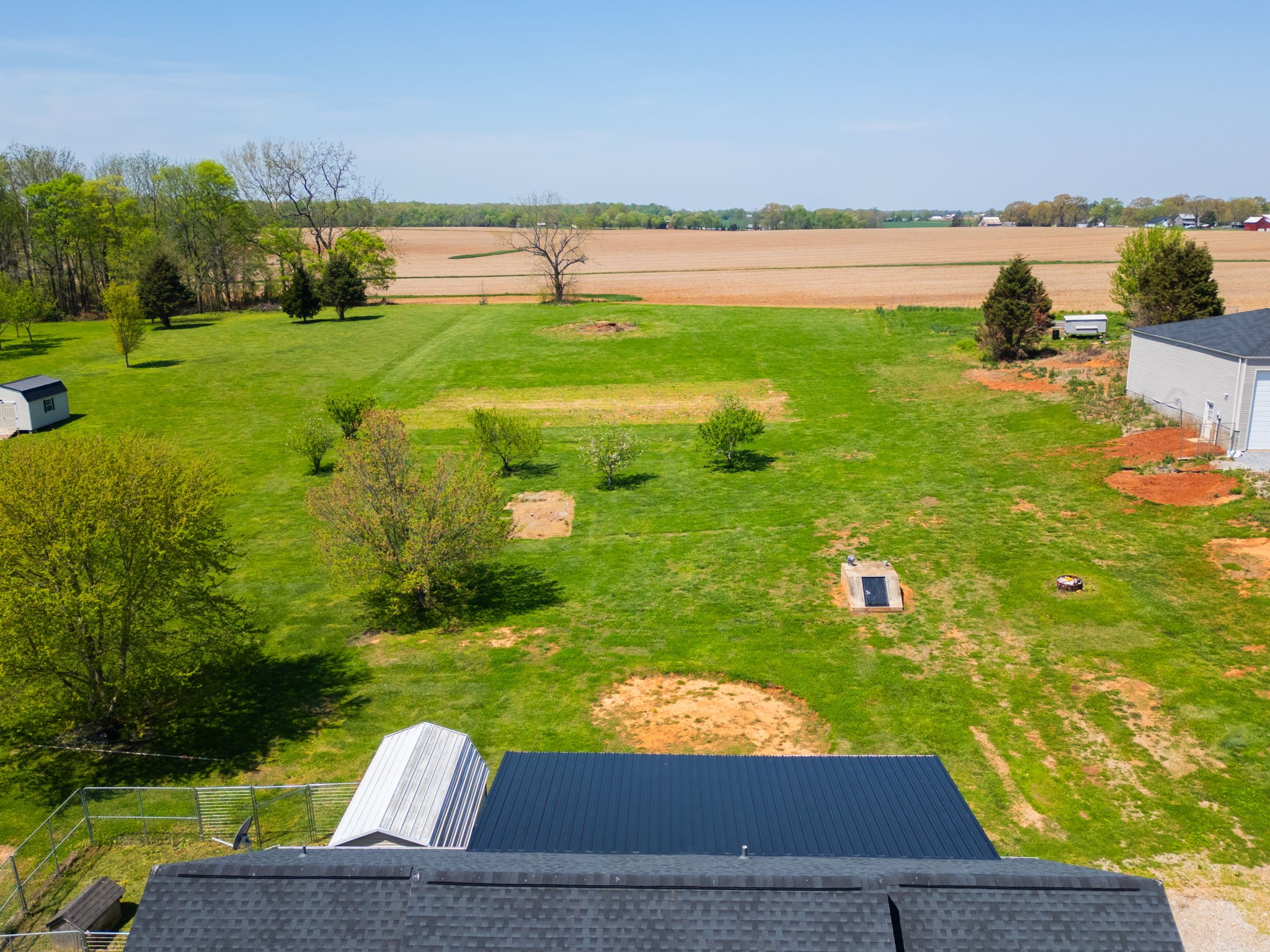 5958 Fred Perry Road Springfield, TN 37172 - Photo 27 of 32 a view of a lake with a yard