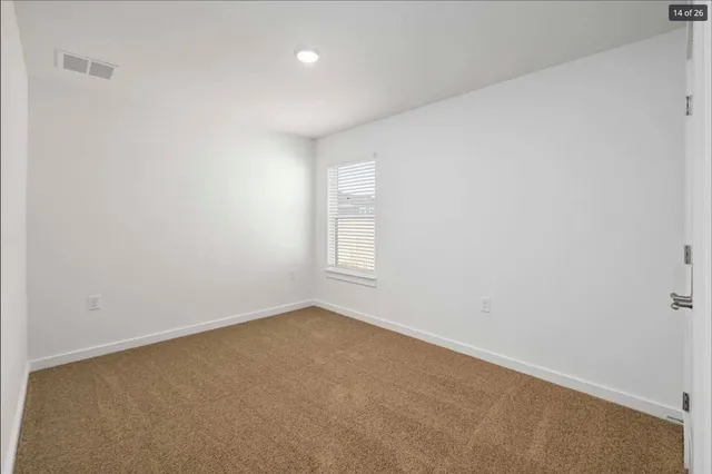 an empty room with a window