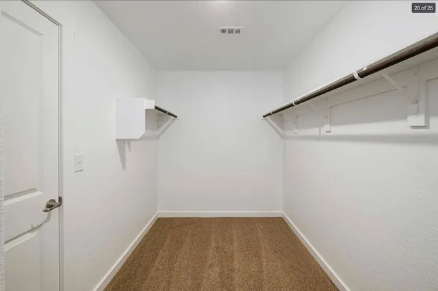 a view of small space with racks on the wall