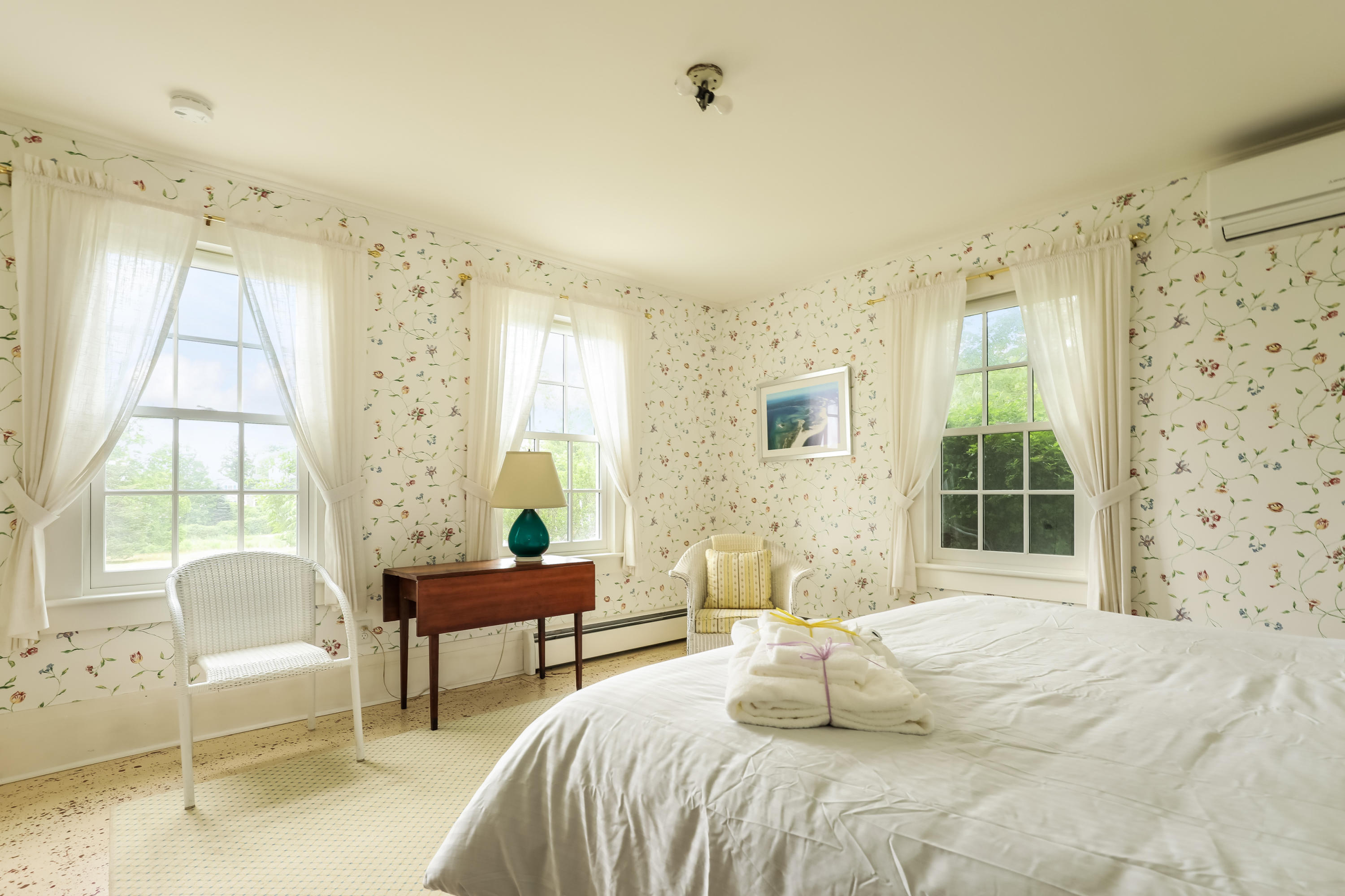 119 Scatteree Road North Chatham, MA 02650 - Photo 25 of 32 a bedroom with a bed and wooden floor