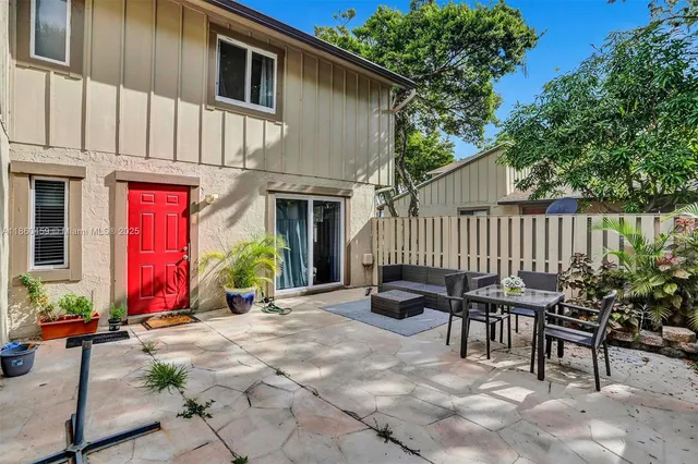 a view of a chairs with a small park