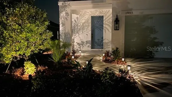 a swimming pool with outdoor seating yard and barbeque oven