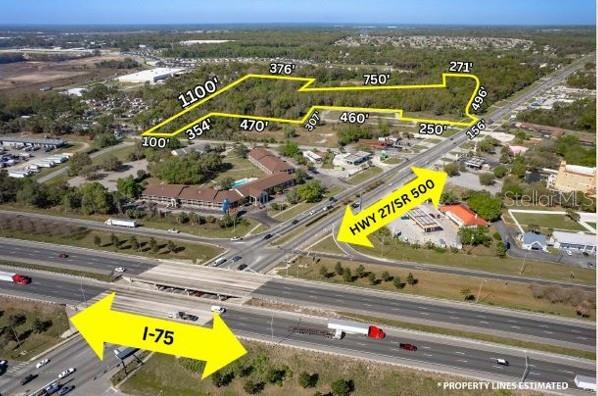 4030 Northwest Blitchton Road Ocala, FL 34482 - Photo 2 of 20 an aerial view of a swimming pool with outdoor seating and yard