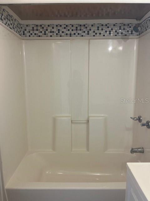 10315 Cortez Road West, Unit 1B Bradenton, FL 34210 - Photo 12 of 48 a bathroom with a shower