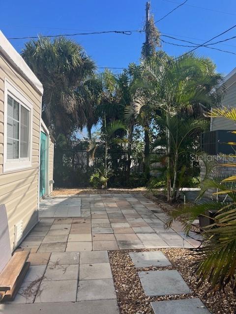 10315 Cortez Road West, Unit 1B Bradenton, FL 34210 - Photo 18 of 48 a view of a pathway both side of house