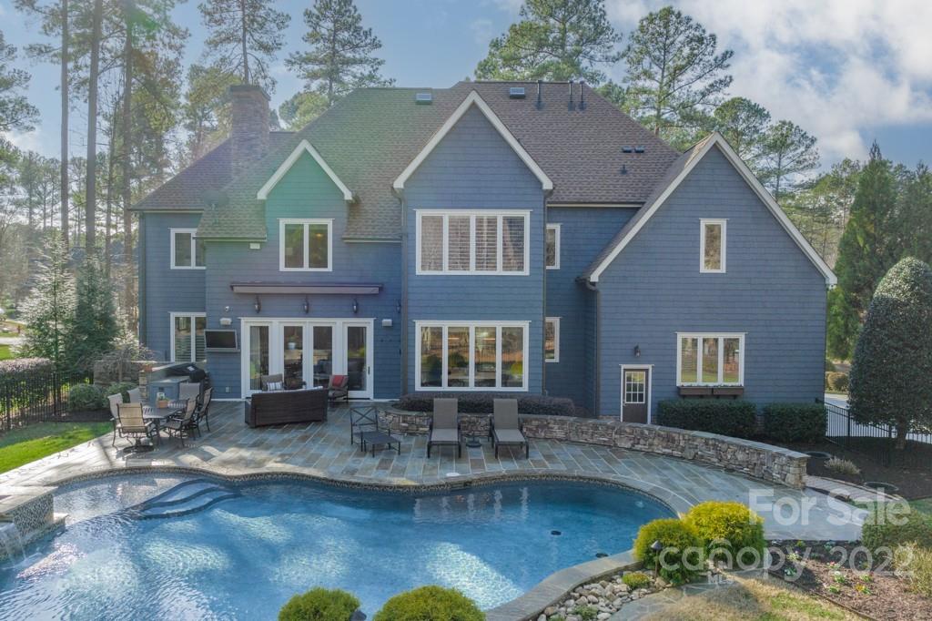 104 Maddaket Loop Mooresville, NC 28117 - Photo 2 of 45 a front view of a house with garden