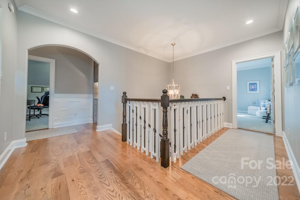104 Maddaket Loop Mooresville, NC 28117 - Photo 23 of 45 a view of a hallway view with wooden floor and entryway