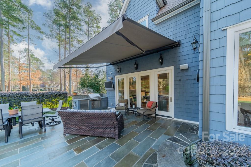 104 Maddaket Loop Mooresville, NC 28117 - Photo 38 of 45 a view of outdoor sitting area with furniture and wooden deck