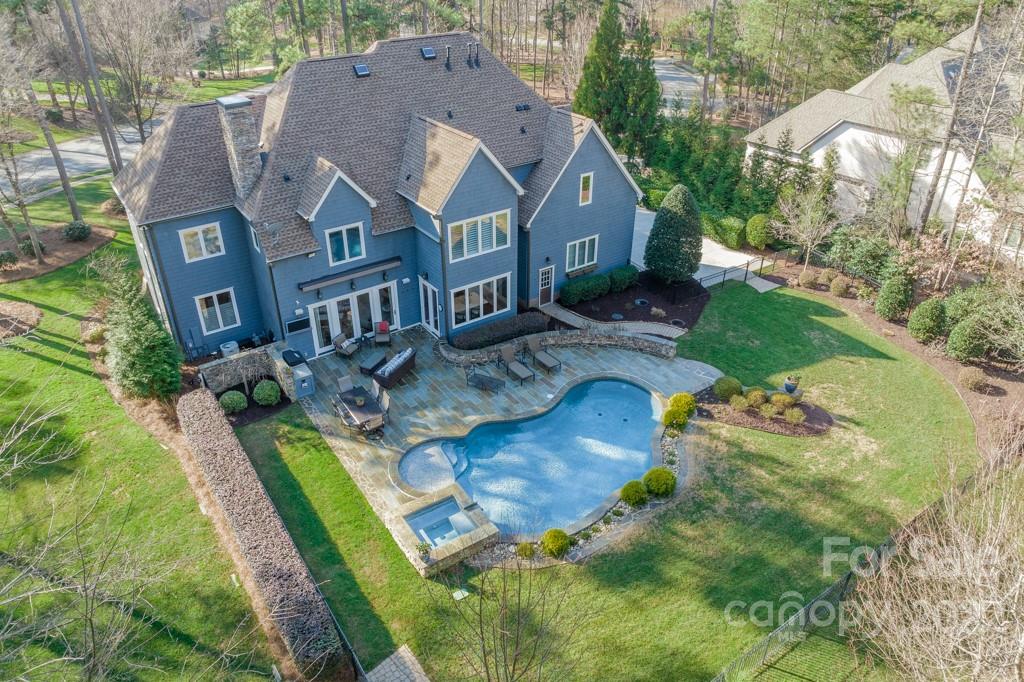 104 Maddaket Loop Mooresville, NC 28117 - Photo 4 of 45 an aerial view of residential houses with outdoor space and trees all around