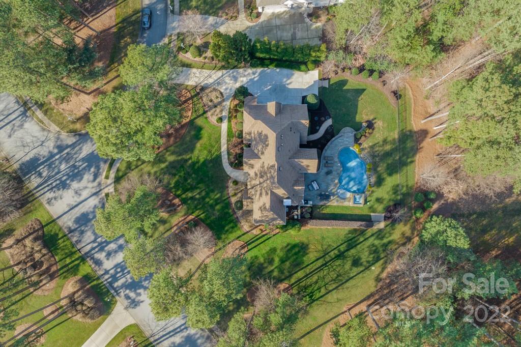 104 Maddaket Loop Mooresville, NC 28117 - Photo 42 of 45 an aerial view of a house with a garden