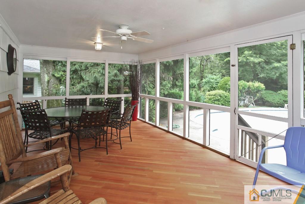 25 Clive Hills Road Edison, NJ 08820 - Photo 9 of 25 a view of a dining room with furniture window and outside view