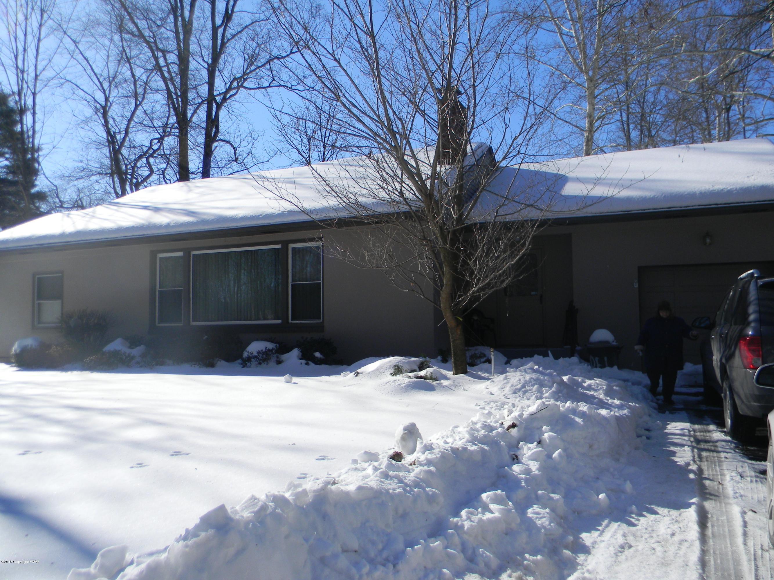 223 Tanite Road Stroudsburg, PA 18360 - Photo 8 of 8 a view of house with snow on the road