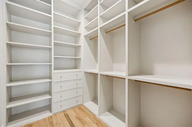 a view of an empty walk in closet