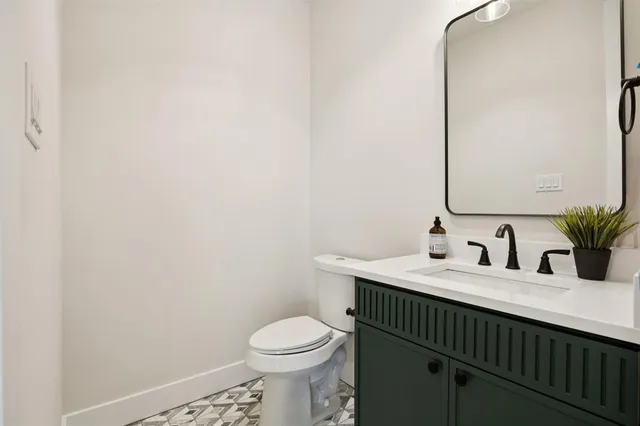 a bathroom with a sink and a toilet