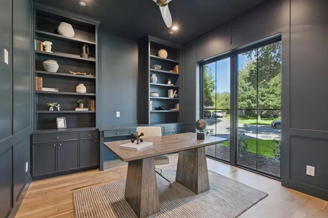 a view of a livingroom with furniture and window