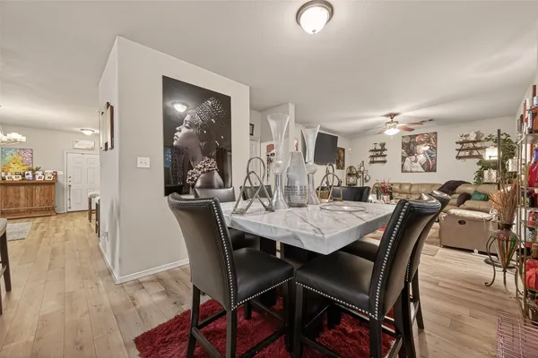 a kitchen with stainless steel appliances granite countertop a sink dishwasher stove and oven