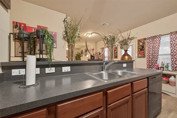 a bedroom with bed and a window