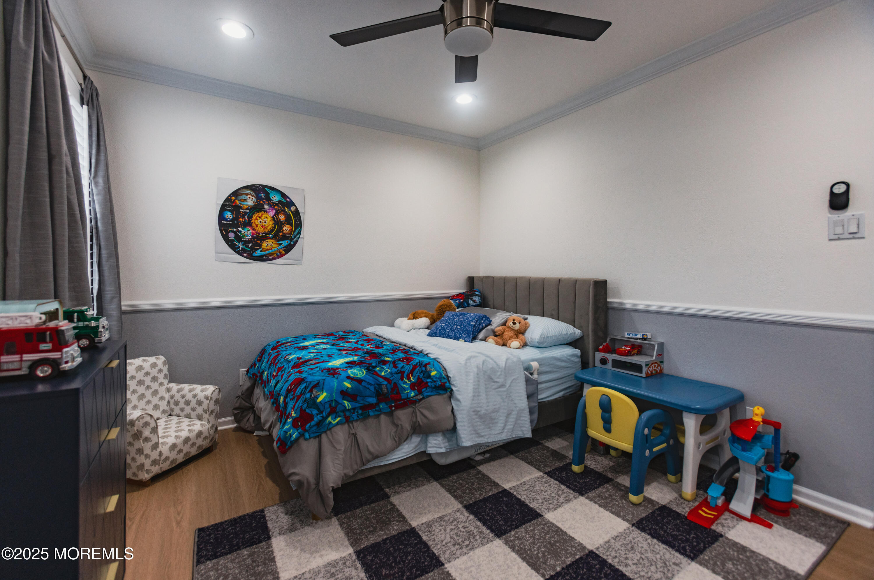 22 Cherry Bend Drive Howell, NJ 07731 - Photo 11 of 16 a bedroom with a bed and a chandelier