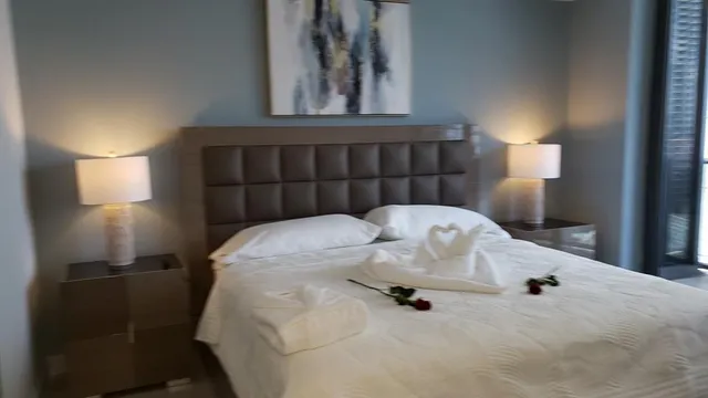 a close view of a bed in a room